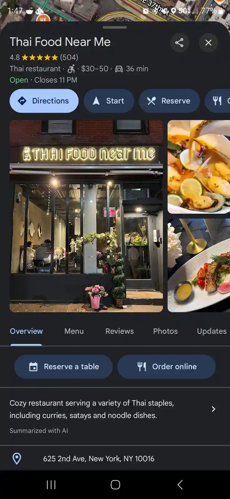 A screenshot of a restaurant listing on a food app shows a Thai restaurant named 'THAI FOOD near me' with a glowing sign…
