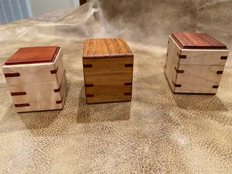The Enigmatic Three Ring Boxes Await