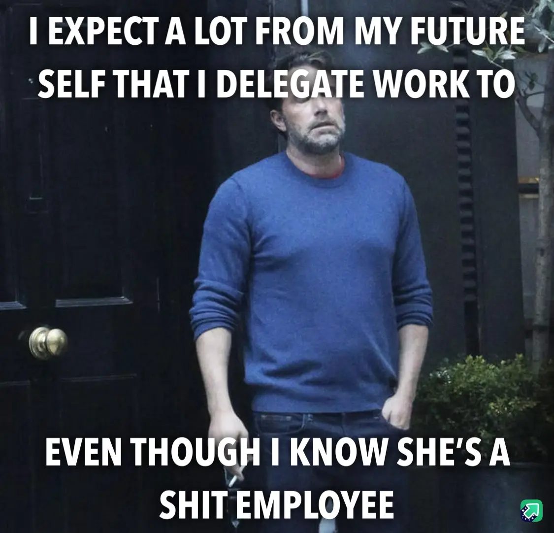 A man in a blue sweater stands in front of a dark door with a weary, resigned expression. White text overlaid in two…
