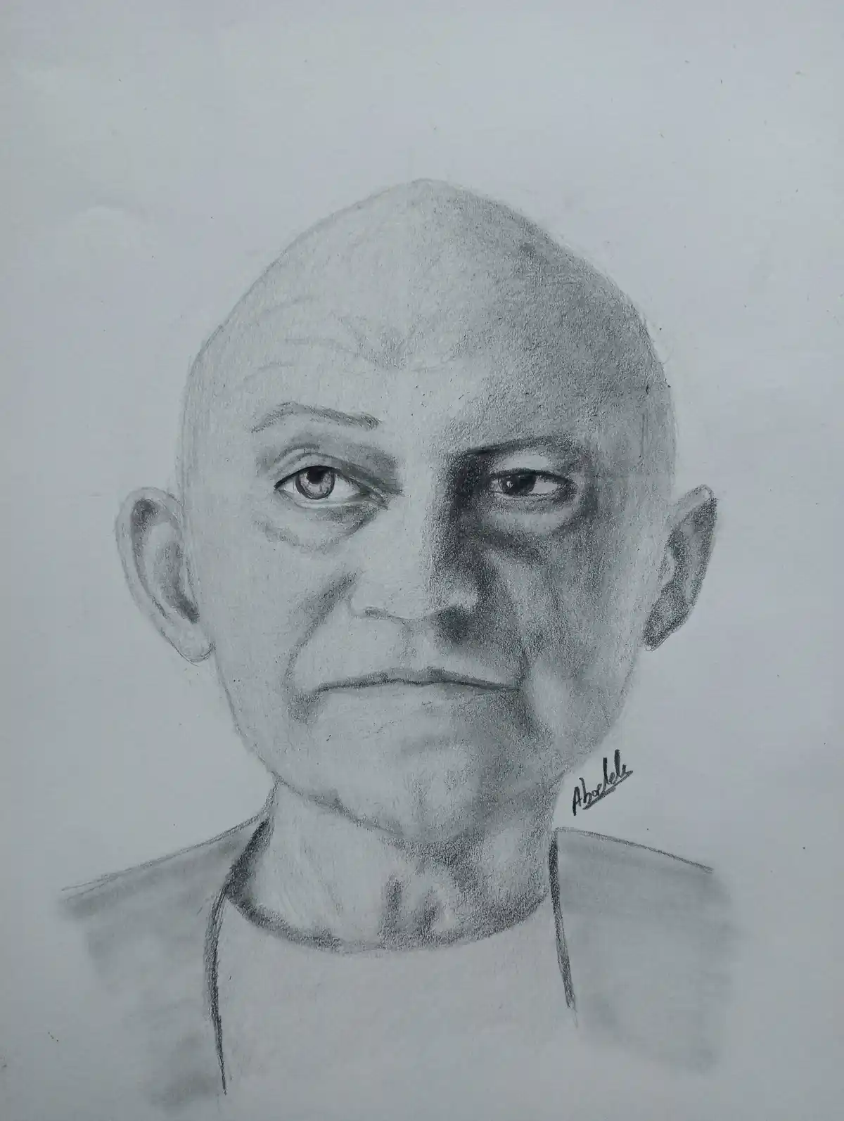 A detailed pencil sketch of a bald man with a stern, unsmiling expression, looking directly at the viewer. The drawing shows…