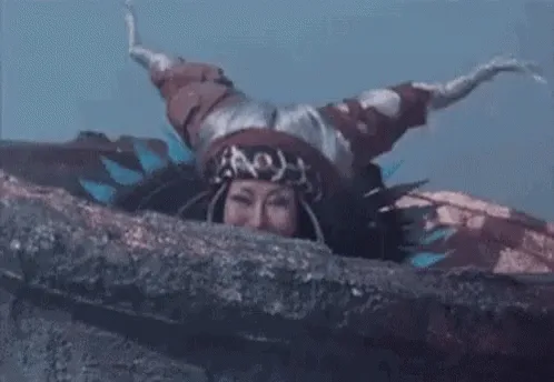 A six-panel image sequence shows a woman in a fantasy costume with a tall, pointed hat and dark, ornate armor peeking over a…