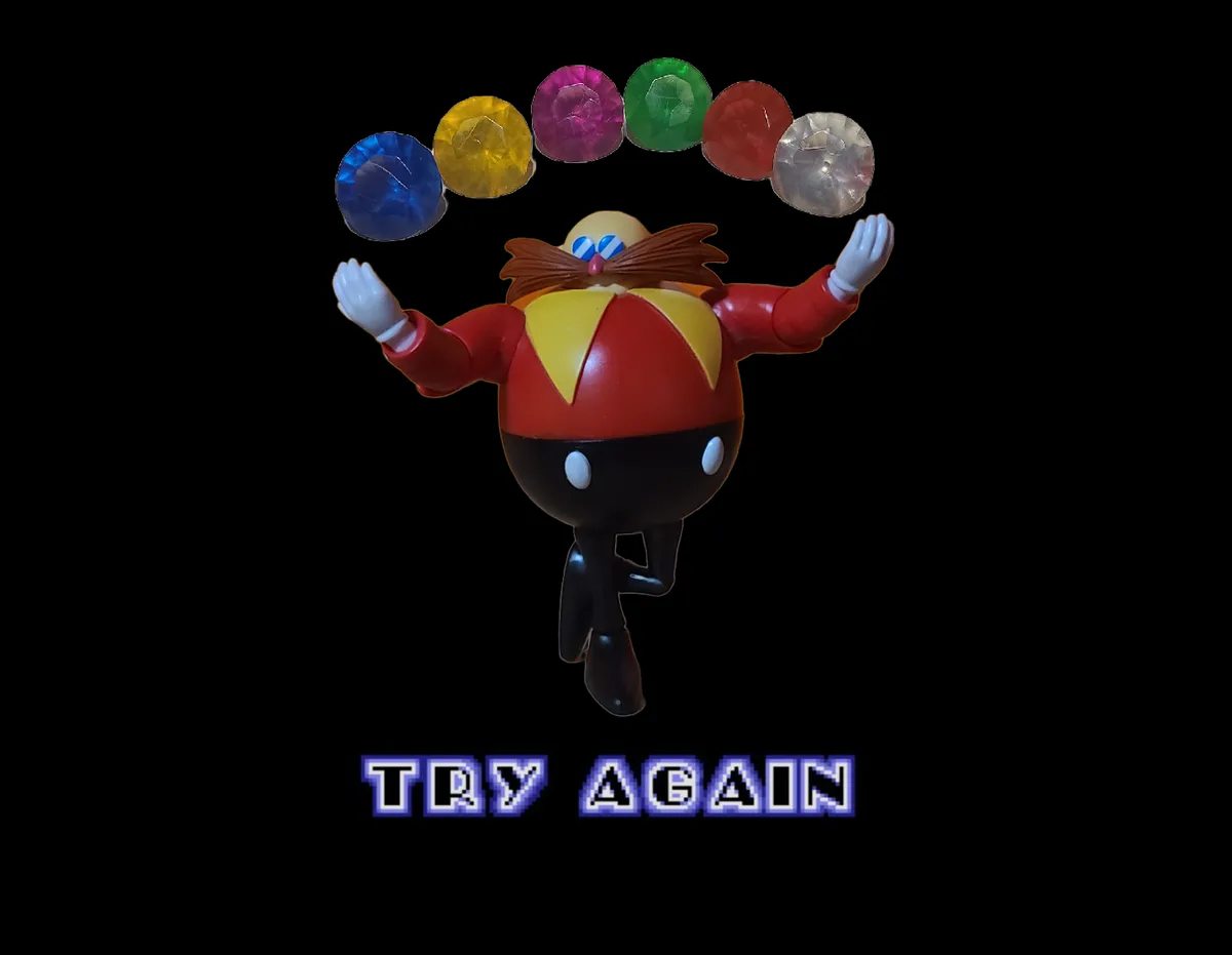 A plastic figurine of Dr. Eggman from Sonic the Hedgehog is shown mid-air with arms outstretched, juggling six colorful…