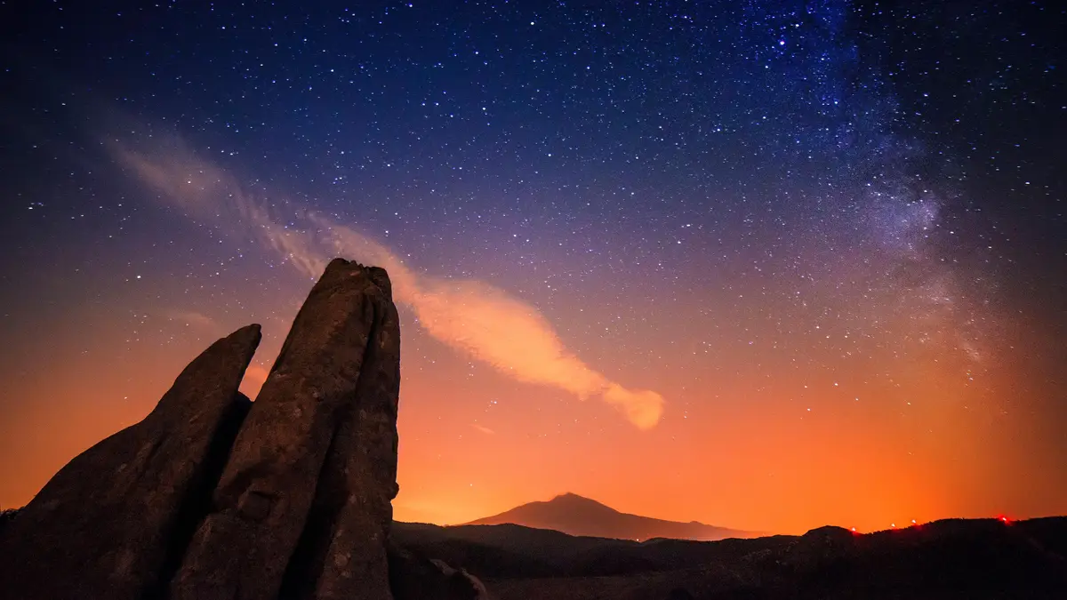In Sicily's ancient Argimusco, a cluster of naturally shaped stones forms an otherworldly landscape, with one megalith…