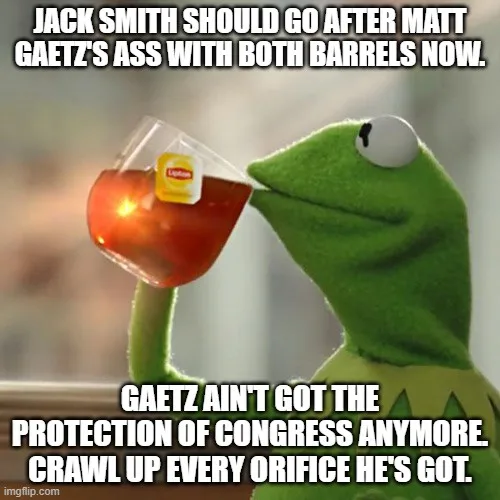 A green frog puppet, Kermit the Frog, is shown sipping tea from a glass teacup with a Lipton tea bag visible. The image has…