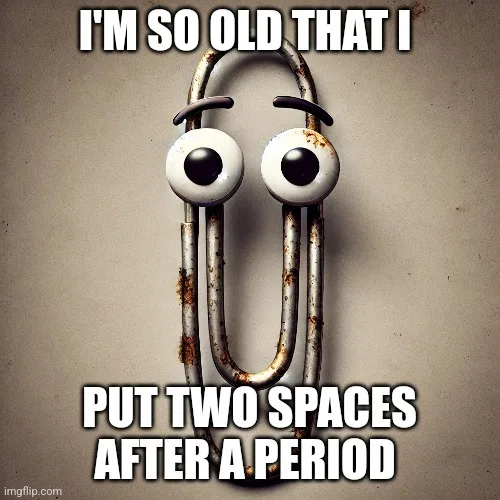 A rusty, old-fashioned metal paperclip with cartoonish googly eyes is shown against a plain beige background. The text…