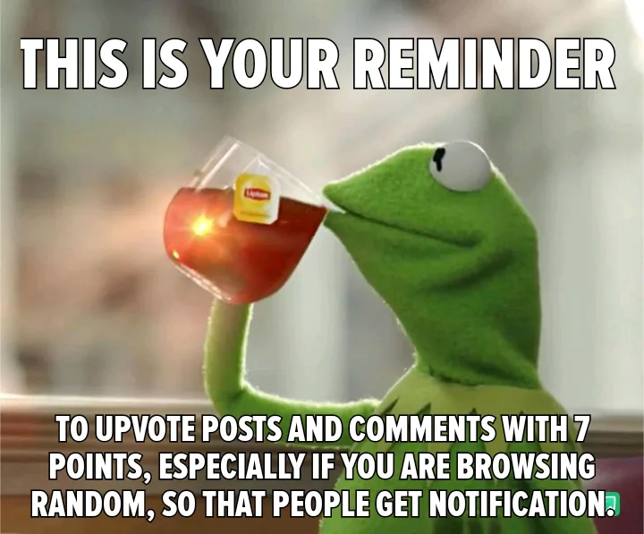 A green frog puppet, Kermit the Frog, is shown sipping tea from a clear glass teacup with a Lipton tag visible. The image…
