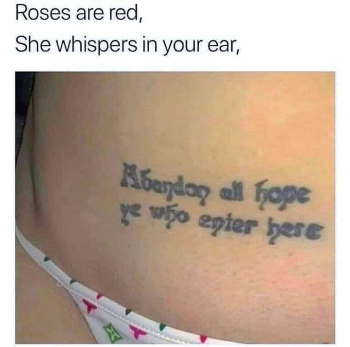 A close-up photo shows a tattoo on a person's lower back that reads 'Abandon all hope ye who enter here,' a phrase from…