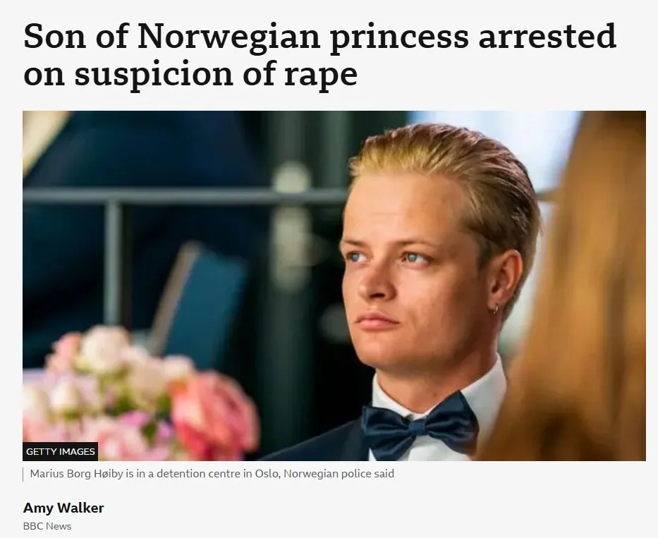 A news article screenshot shows a man in a tuxedo with a bow tie looking off to the side with a serious expression. The…