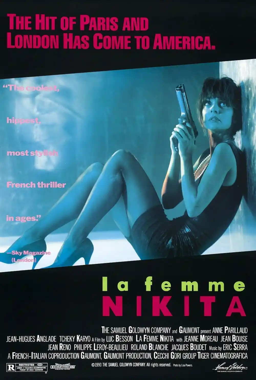 This is a movie poster for 'La Femme Nikita' featuring a woman in a black dress and high heels holding a gun while leaning…