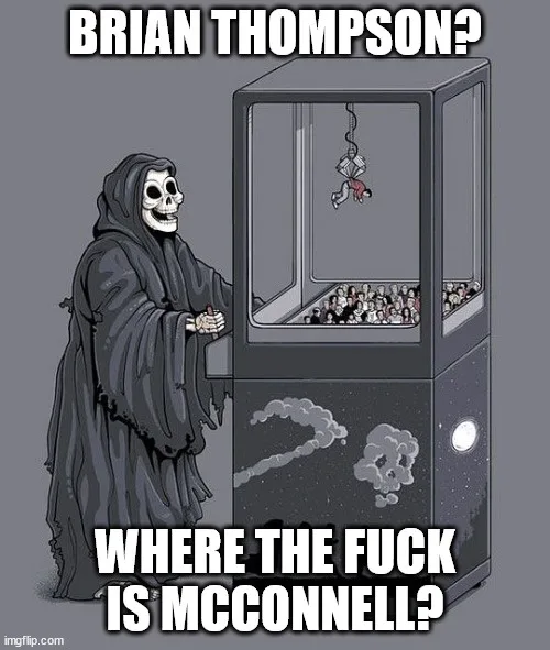 A grim reaper stands beside a claw machine filled with small figures, looking up at a person hanging from a hook inside. The…