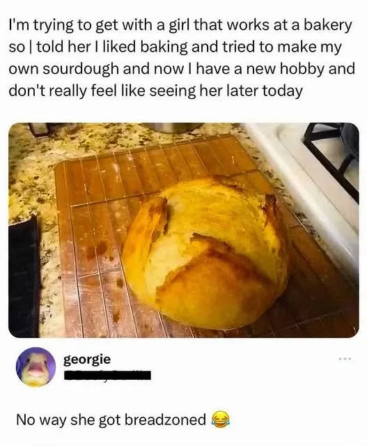 A round, golden-brown sourdough loaf sits on a wooden cooling rack on a kitchen counter. Overlaid text reads: 'I'm trying to…