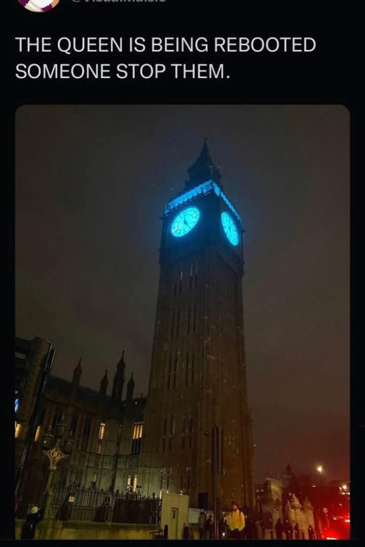 A nighttime photo of the Elizabeth Tower (Big Ben) in London, its clock faces illuminated in bright blue light. White text…