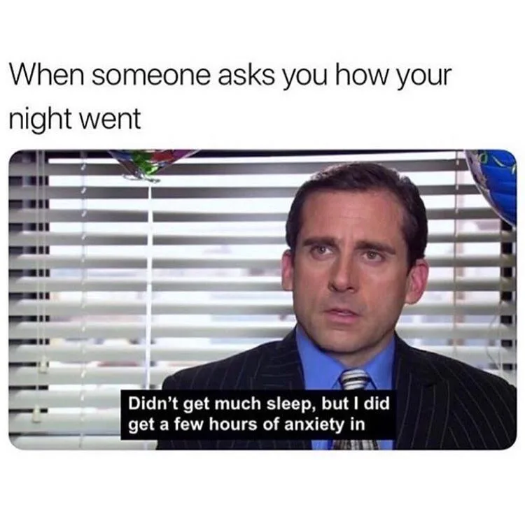 A still image of Michael Scott from The Office, looking slightly bewildered and concerned, wearing a pinstripe suit and tie…