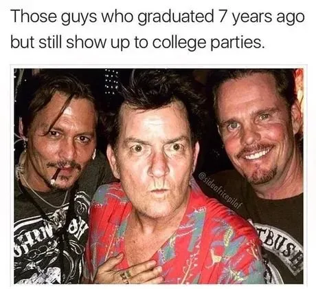 Three men are photographed together at what appears to be a party. The man in the center, wearing a red patterned shirt, has…