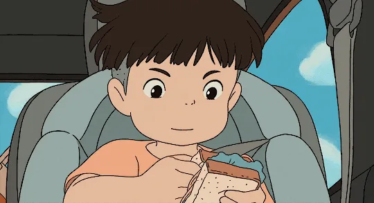 The image shows two horizontal panels from the animated film 'My Neighbor Totoro'. The top panel features a young boy with…