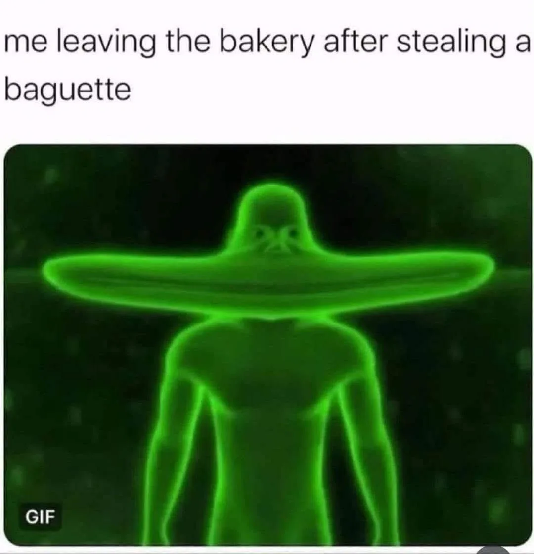 A green thermal-imaging style image shows a human silhouette with a wide, flat baguette-shaped object on their head…