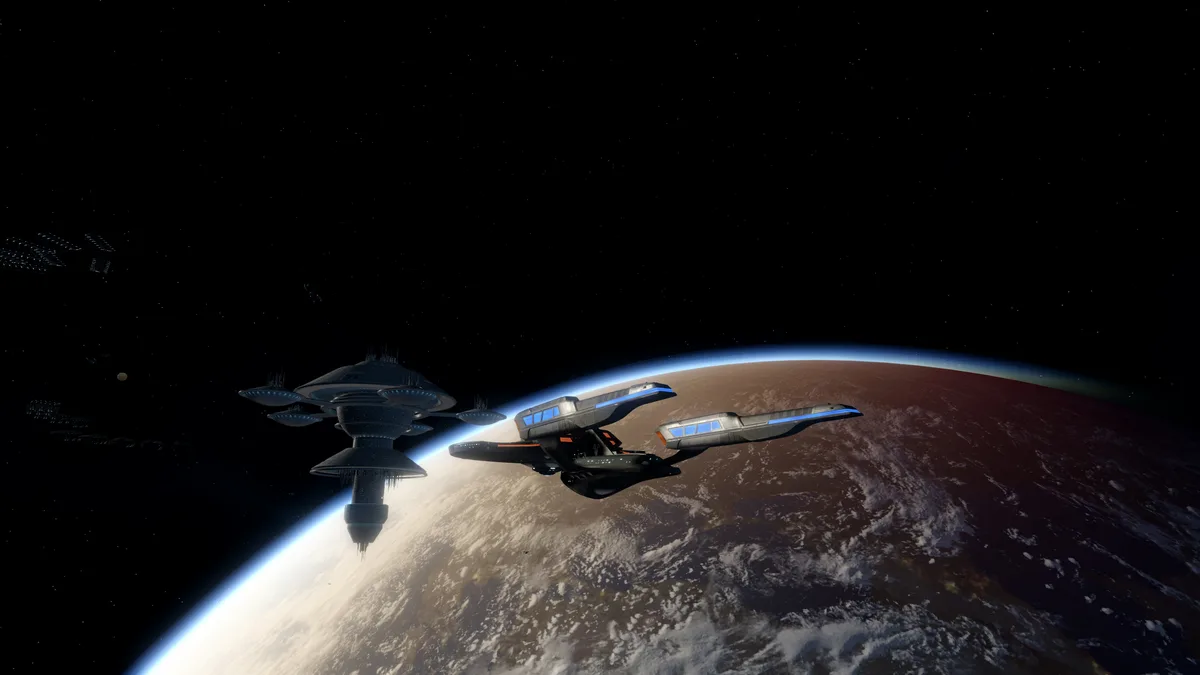 A space scene featuring a large, multi-tiered starship and a smaller, sleeker starship flying near a planet's curved…