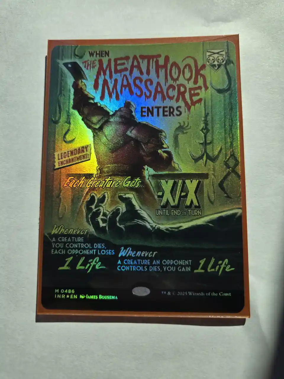 A Magic: The Gathering card titled 'When The Meat Hook Massacre Enters' is shown, featuring a grotesque, meaty hand holding…