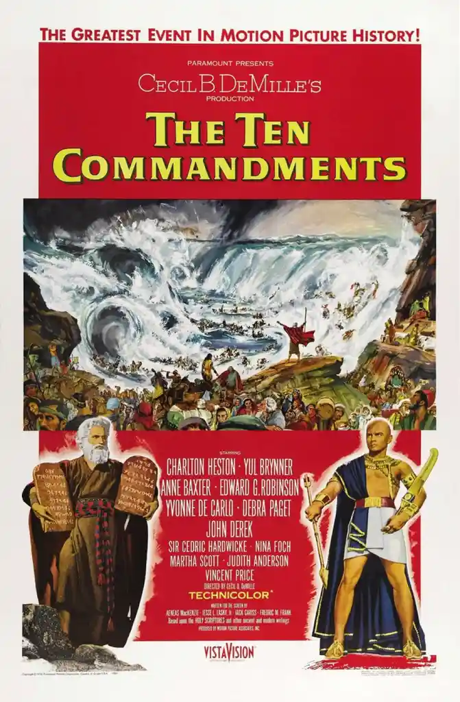 This is a vintage movie poster for Cecil B. DeMille's 1956 epic 'The Ten Commandments,' featuring Charlton Heston as Moses…