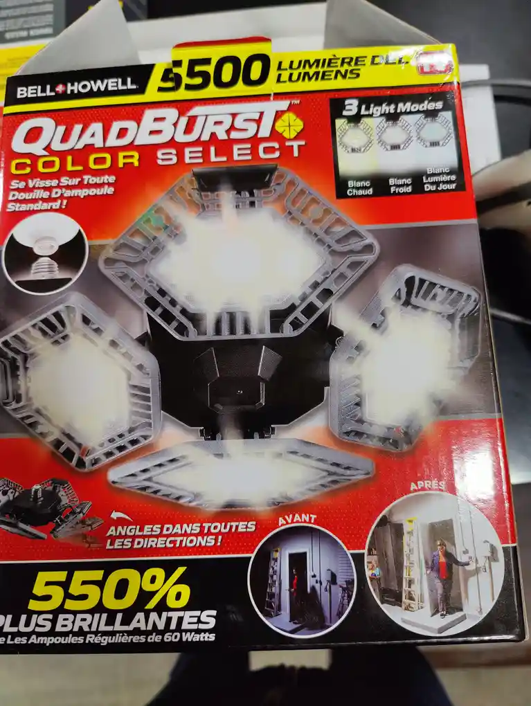 A product box for a Bell+Howell QuadBurst Color Select LED light bulb, featuring a graphic of the bulb emitting bright light…