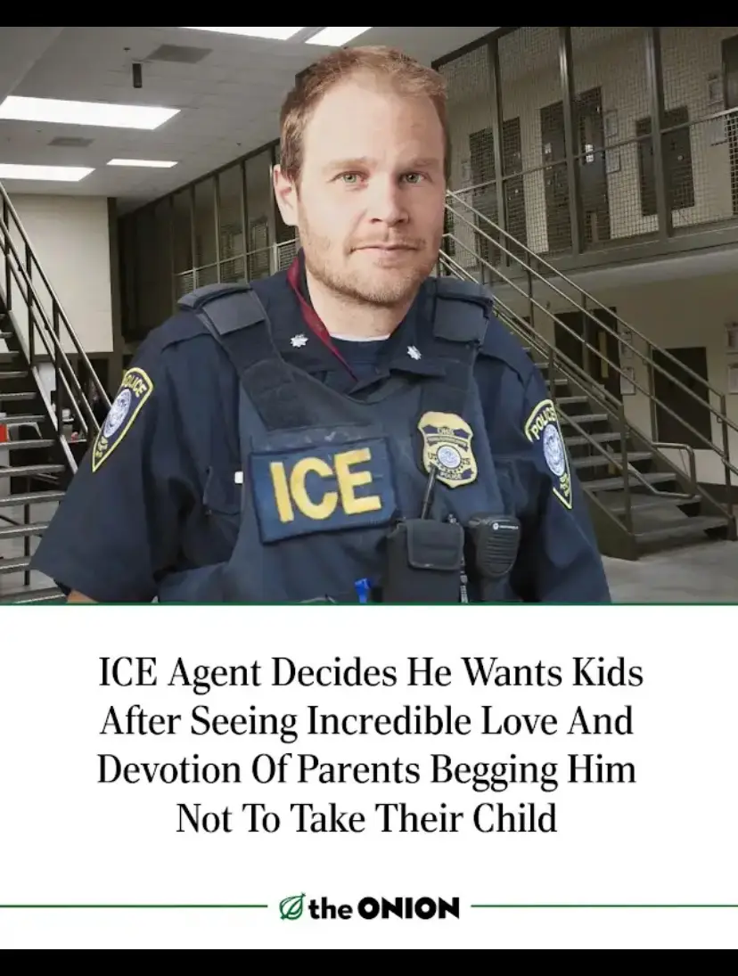 A man in an ICE uniform stands in what appears to be a jail or detention center hallway with stairs and barred cells in the…