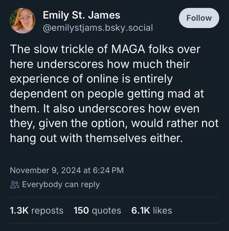 A screenshot of a social media post by Emily St. James on a dark-themed platform, showing her profile picture, username, and…