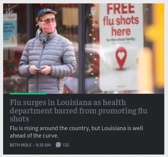 A man wearing a patterned face mask and a grey puffer jacket stands outside a storefront with a visible sign advertising…