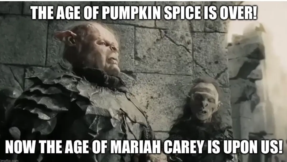 Two grim-faced, orc-like characters from a fantasy setting stand before a stone wall. The larger one in the foreground…