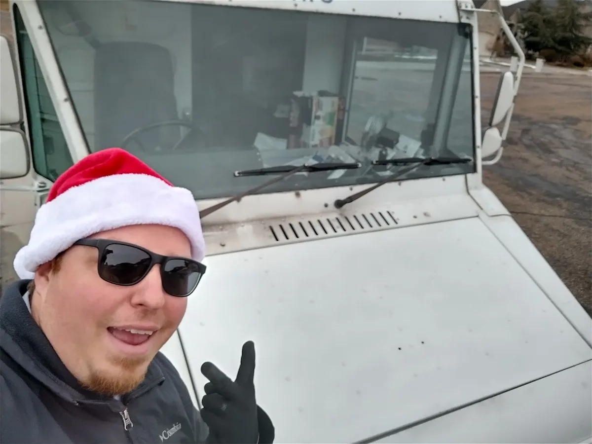 Merry Christmas from the World's Most Reluctant Mail Carrier!
