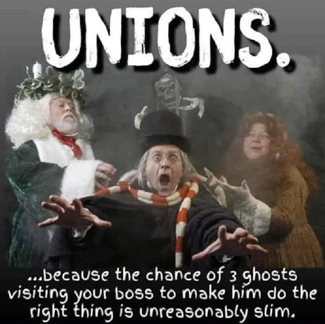 The image shows three ghosts from the play 'The Ghosts of Christmas Past'—a man in a green robe with a wreath, a man in a…