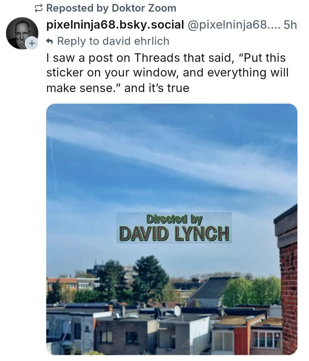 An image of a suburban rooftop view under a blue sky with wispy clouds, overlaid with a transparent film strip-style graphic…