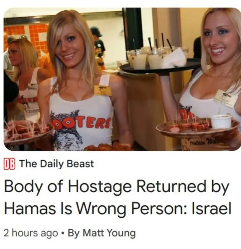 Two smiling blonde women in white 'Booters' branded tank tops serve drinks and snacks on trays at what appears to be a…