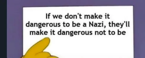 A cartoon hand points at a white text box with black text that reads: 'If we don't make it dangerous to be a Nazi, they'll…