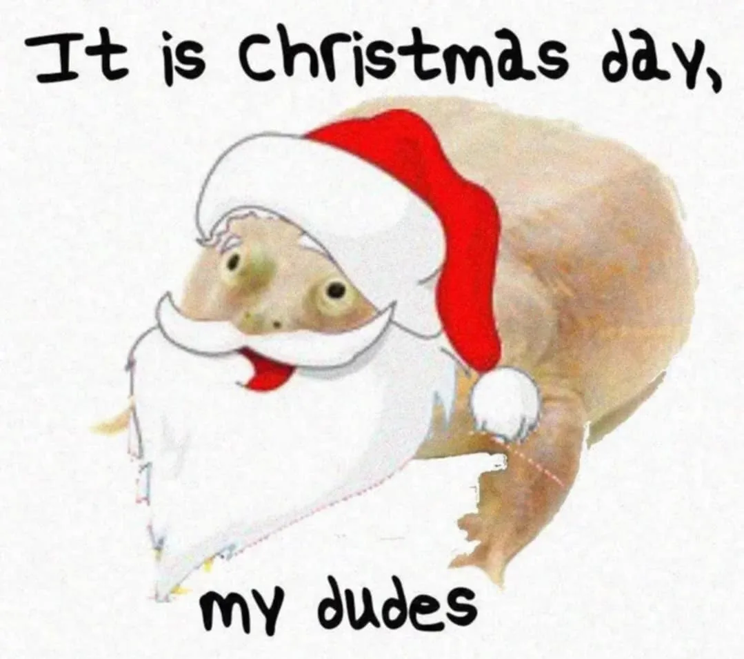 A cartoonish, tan-colored animal with large eyes and a small mouth is dressed as Santa Claus, wearing a red hat with white…