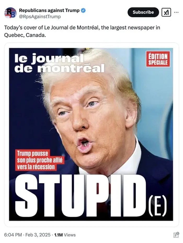 The image shows a close-up of Donald Trump with his mouth open, overlaid with the text 'STUPID (E)' in large white letters…