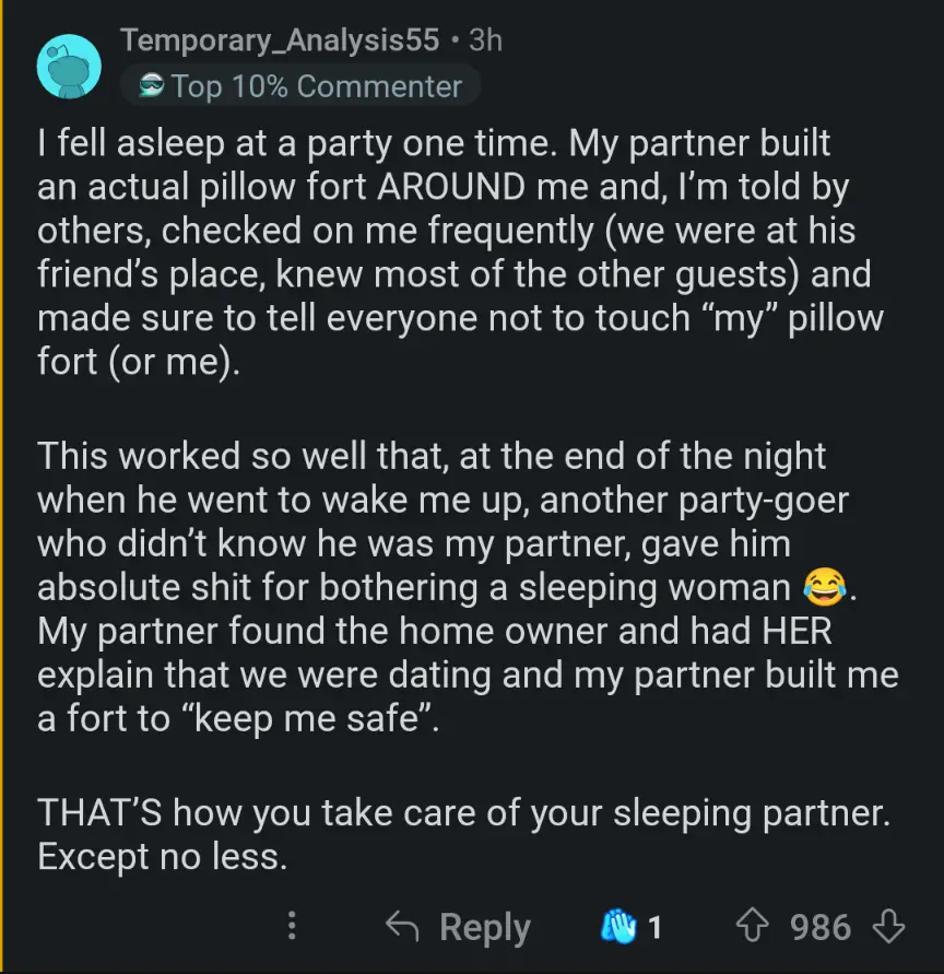 A Reddit comment screenshot showing a user describing how their partner built a pillow fort around them at a party to keep…
