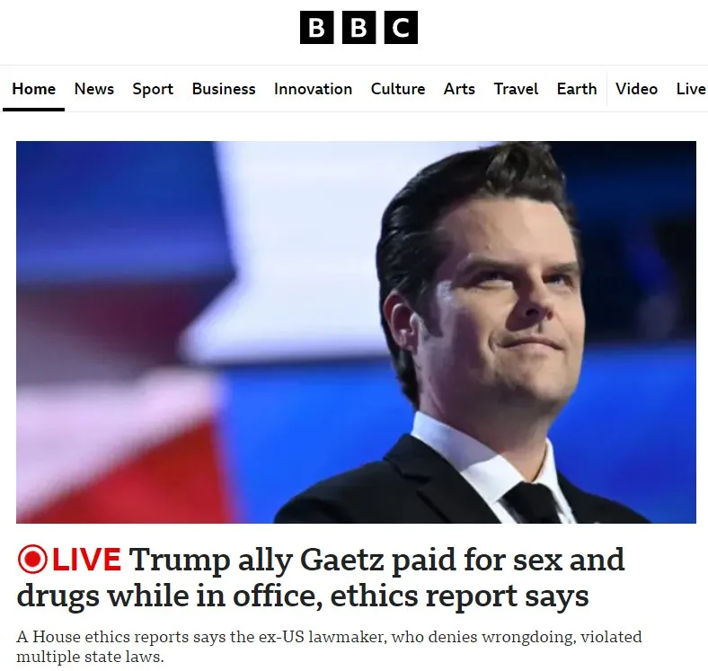 A screenshot of a BBC news article shows a photo of a man in a suit looking upward with a slight smirk. The headline reads…