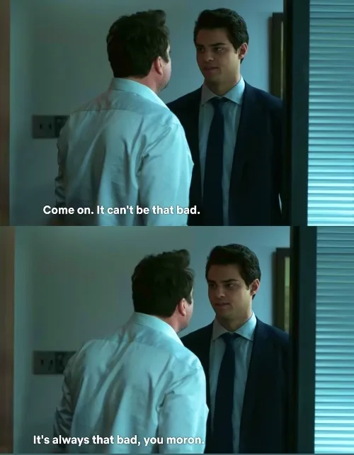 Two men are shown in a split-screen image. In the top panel, a man in a light blue shirt faces another man in a dark suit…