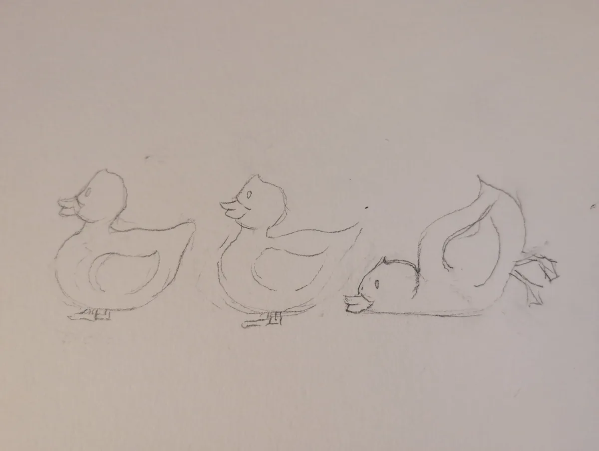 A simple pencil sketch on light-colored paper shows three cartoon-style ducks in a row. The first two ducks are standing…
