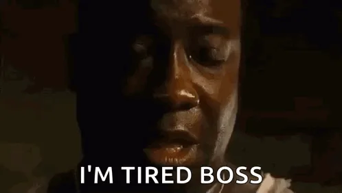 The image displays a repeated sequence of a man's weary, exhausted facial expression, overlaid with the text 'I'M TIRED…