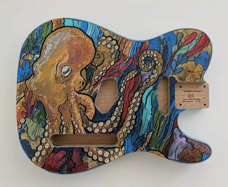 A hand-painted guitar body shaped like a Telecaster, featuring a detailed, colorful illustration of an octopus with…