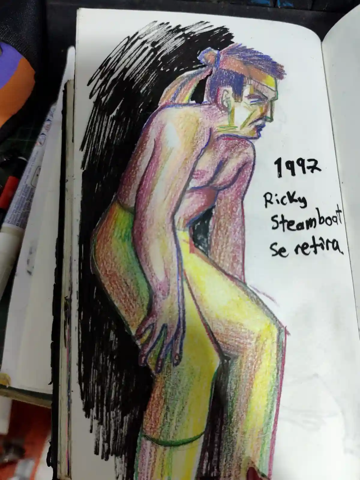 A colorful, sketch-style drawing in a notebook depicts a muscular, shirtless man in yellow trunks sitting slumped with his…