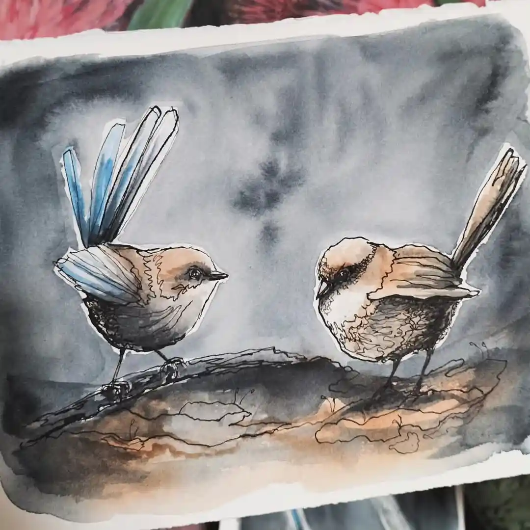 A watercolor painting shows two small birds perched on a branch; the bird on the left has bright blue tail feathers and…