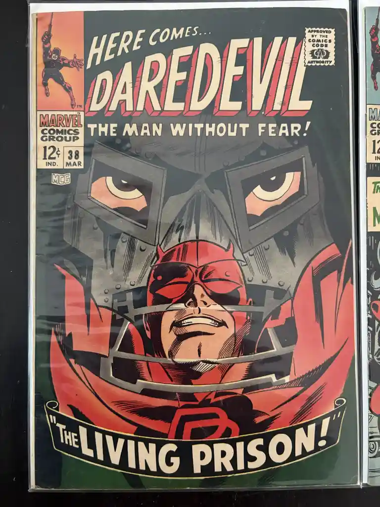 A vintage Daredevil comic book cover from Marvel Comics Group, issue #38, priced at 12 cents, featuring the hero in his red…