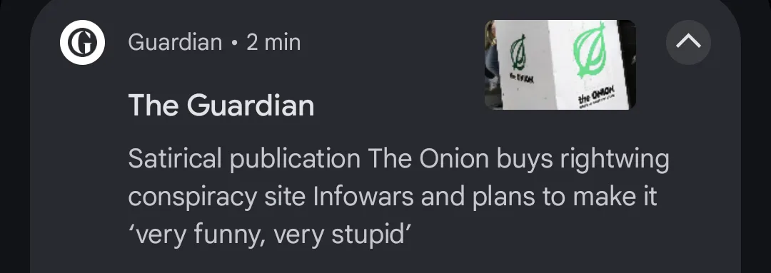 A screenshot of a Guardian news alert shows a thumbnail image of two white signs with green logos. One sign displays 'the…