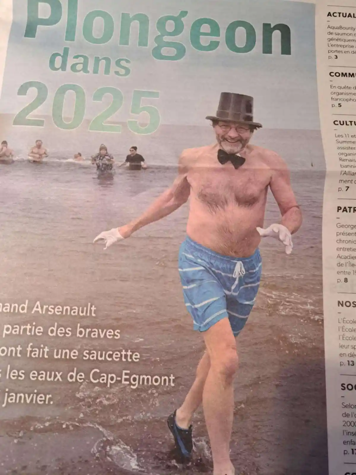 A newspaper clipping shows a smiling older man in blue swim trunks, a top hat, a bow tie, and white gloves, running out of…