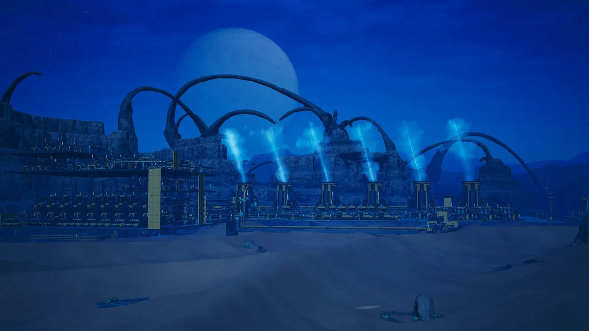 A screenshot from a video game shows a futuristic, alien industrial complex at night under a large, pale blue moon. The…