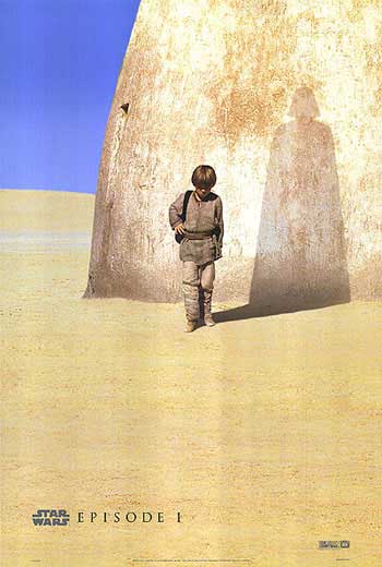 A young boy in a desert stands before a large, curved stone structure, casting a long shadow that resembles a towering…