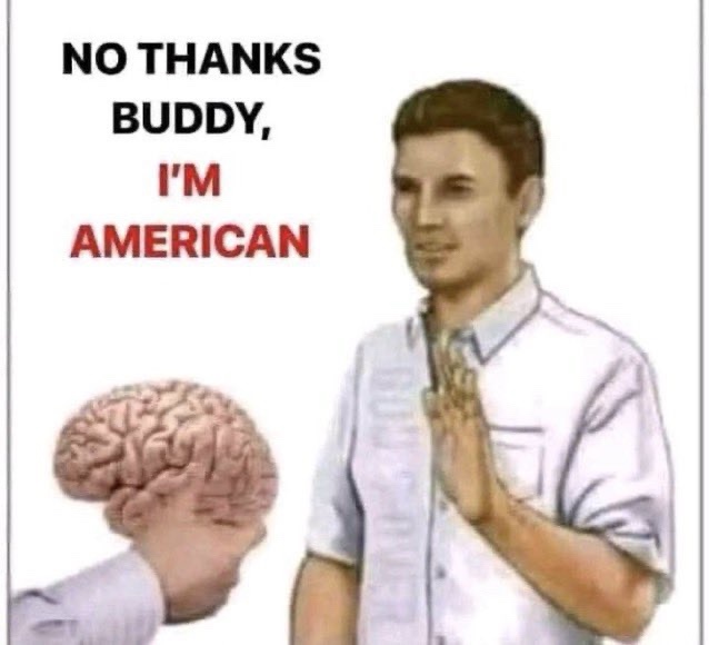 A man in a light-colored shirt stands with his hands clasped in a polite refusal gesture, facing a disembodied human brain…