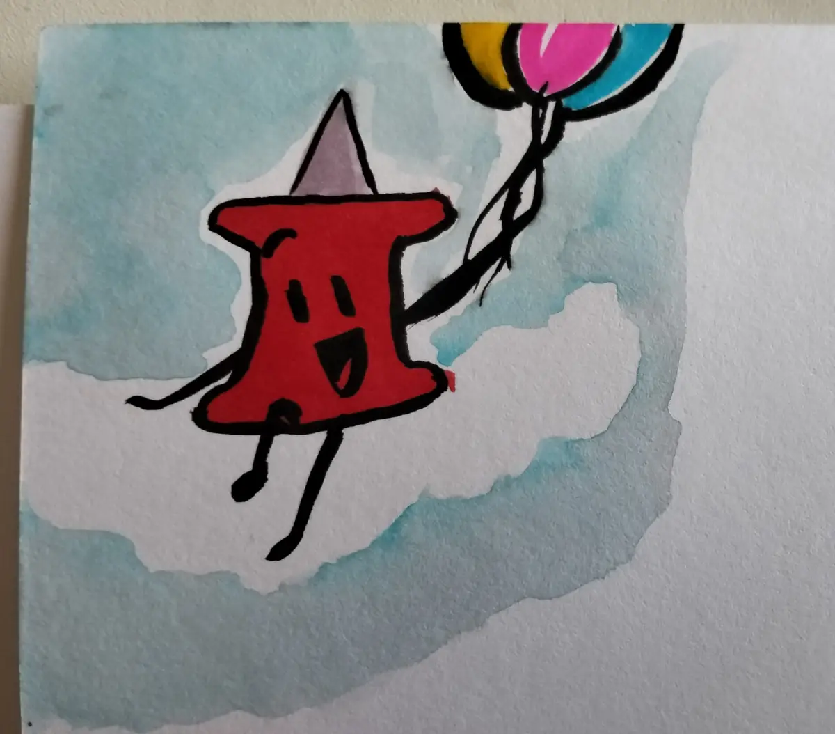 A watercolor drawing shows a red, anthropomorphic pushpin with a smiling face, wearing a purple party hat, floating joyfully…